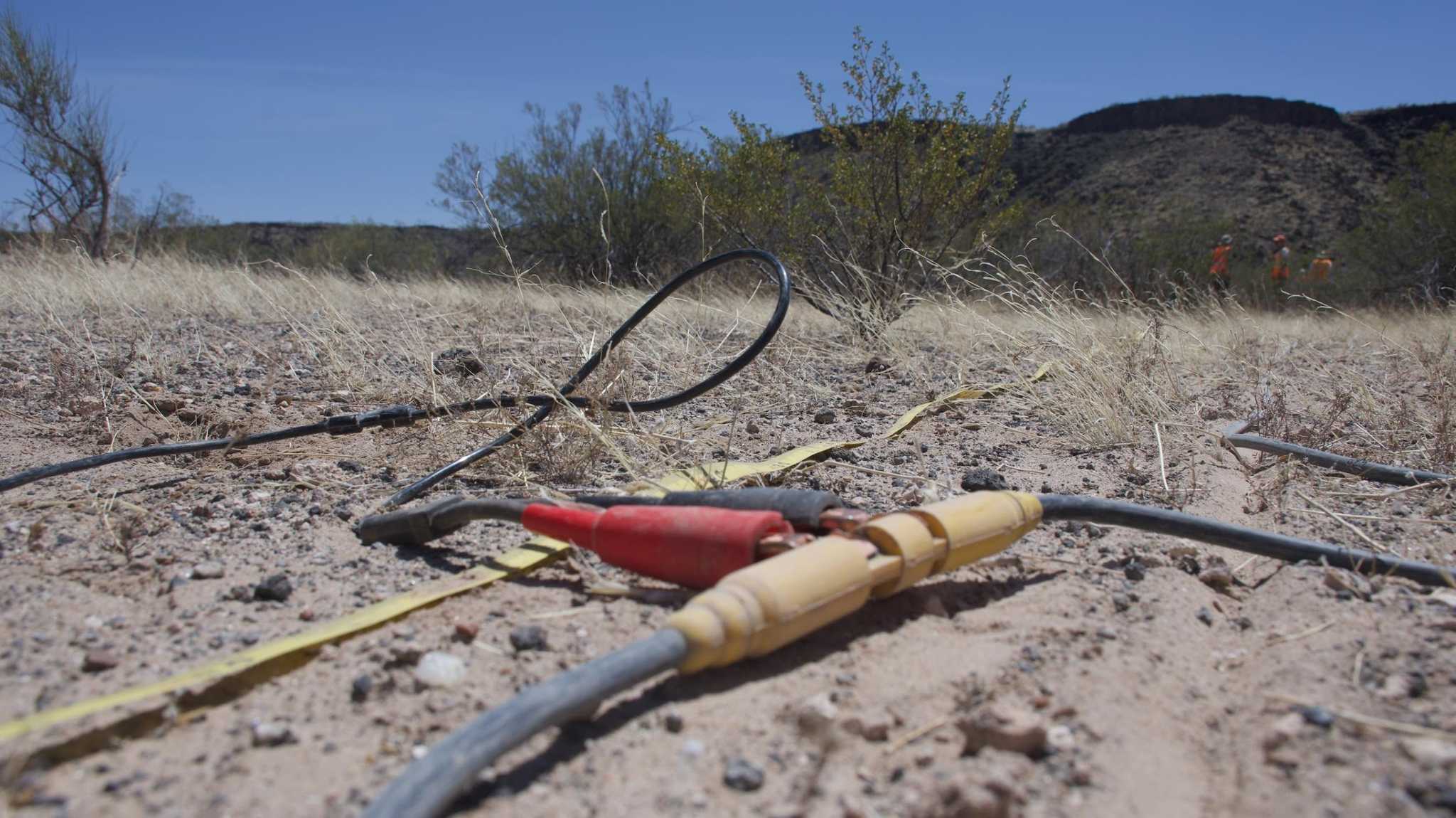 Geophones plugged into the electrical line that will send seismic data to a computer.