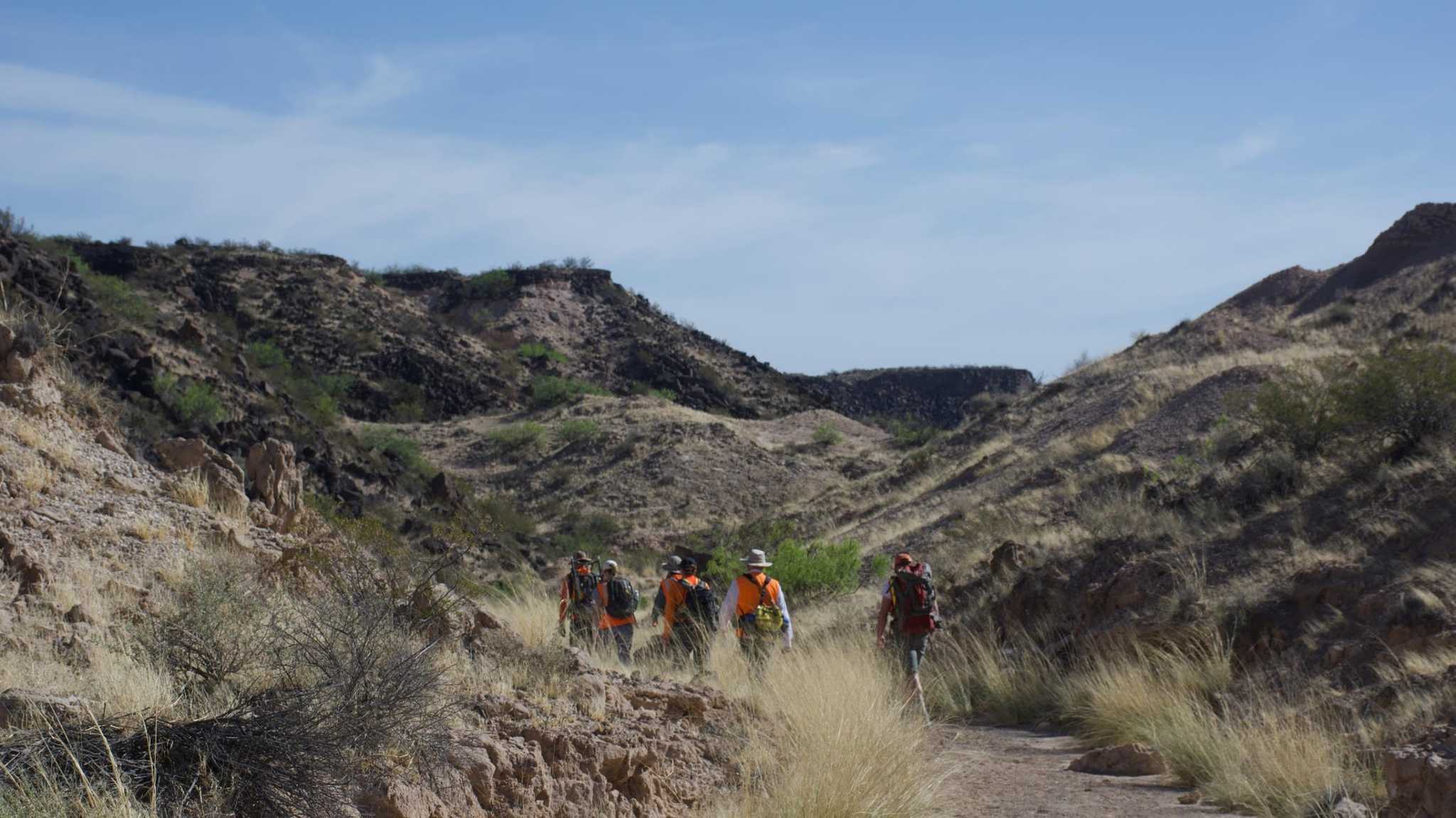 The GEODES team embarks on the 2-mile hike out of Kilbourne Hole.