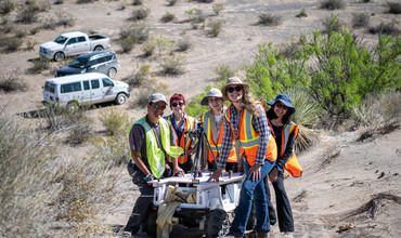 Hurtado with his students and Moon rover at Potrillo Volcanic Field in New Mexico, April 2022