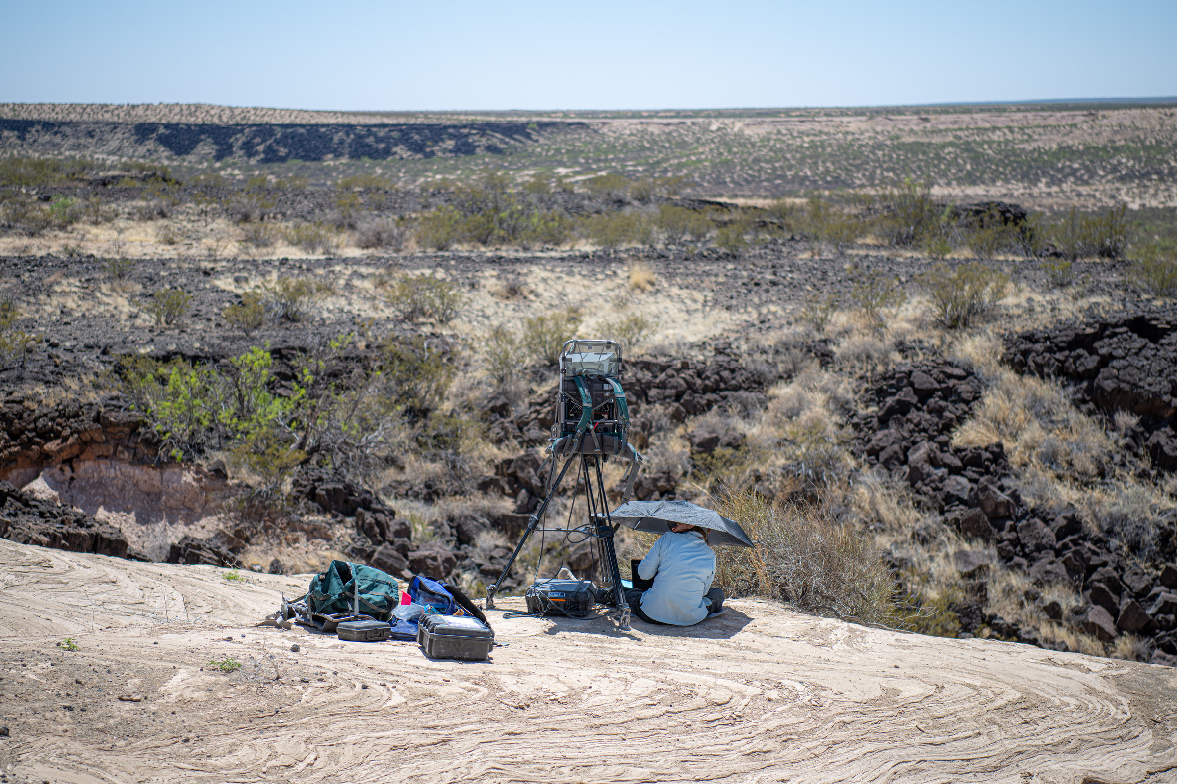 Deanne Rogers scans outcrop with hyperspectral imager