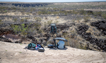 Deanne Rogers scans outcrop with hyperspectral imager