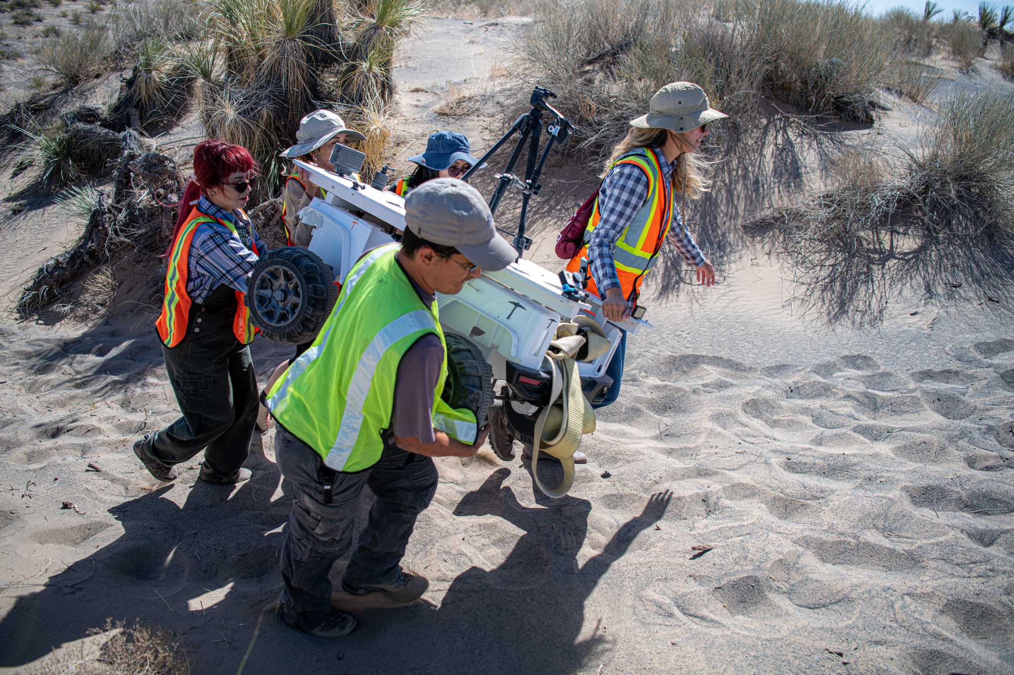 Hurtado with his students and Moon rover at Potrillo Volcanic Field in New Mexico, April 2022